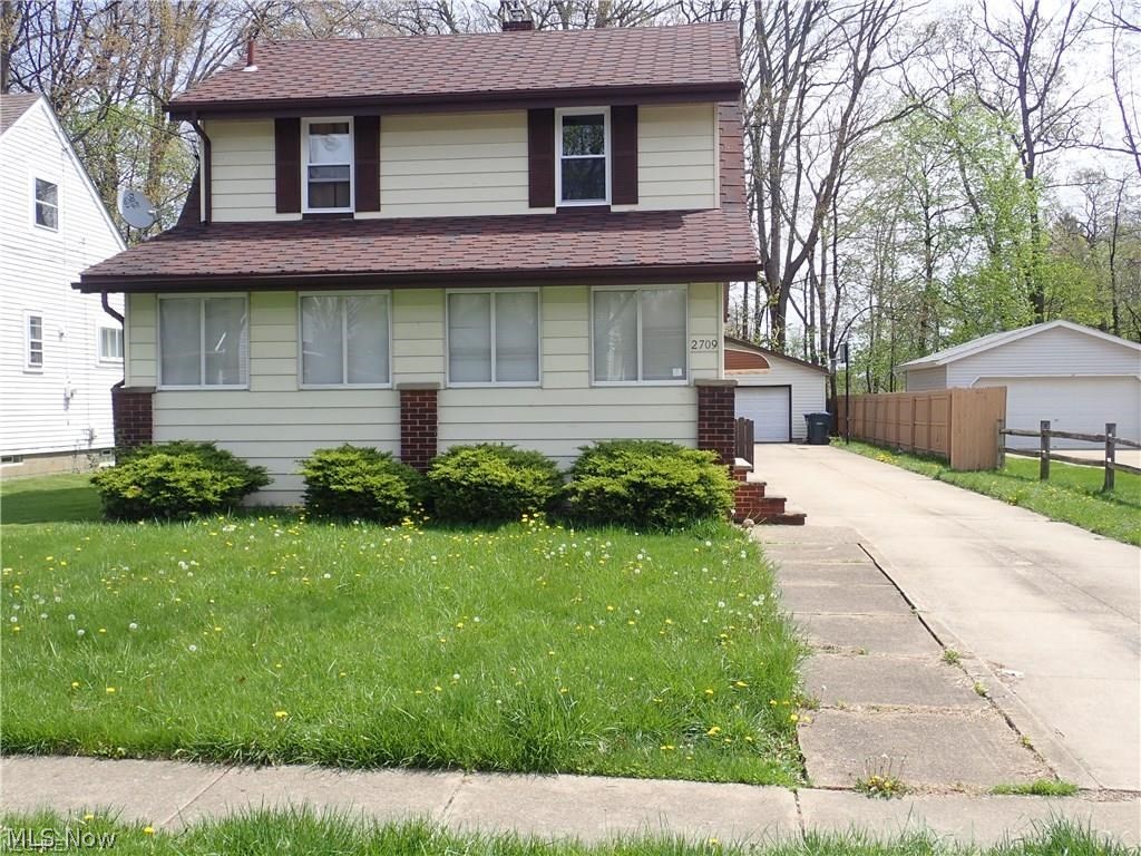 Welcome home to this remodeled 3 bedroom, 1 bath colonial! All new kitchen with tile flooring and beautiful back splash! New bathroom with ceramic flooring and ceramic shower surround! New flooring throughout! Some new windows! Some hard wood flooring and built ins too! Large yard with deck! Enclosed front porch! 2 Car Garage! Close to downtown, shopping, dining and fast highway access too! Don't wait! Schedule your showing today!