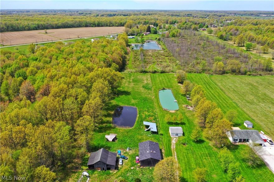Peaceful 3 acre country lot in Edinburg Township, Southeast school district. The former home burned down and this would make a great parcel of land for a new home to be built with some improvements already in place including the driveway. Nice 36x50 three bay pole building garage with concrete floor and is also wired for electric. Older barn still usable for livestock. Beautiful stocked pond. A new well and septic will need to be installed for a new home. Call to schedule a time to walk the land!