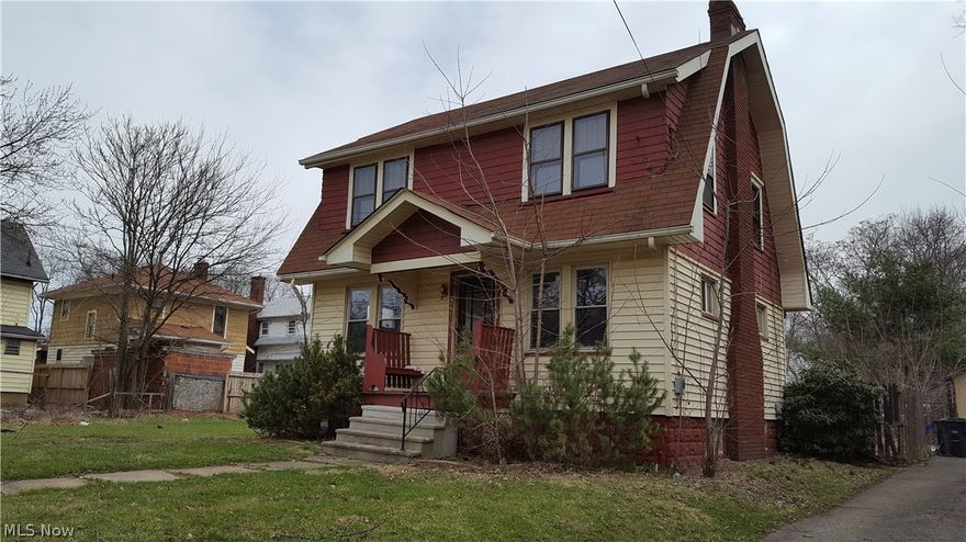 This spacious Dutch Colonial home is just waiting for some work to restore it to its previous glory! Beautiful dark woodwork, spacious living and dining rooms, attractive fireplace feature wall, large kitchen and bathroom are all on first floor. Second floor has oversize bathroom with vintage soaking tub, and three large bedrooms with nice natural light. Glass block provides good light into basement. Detached one car garage. Needs rehab, but has great bones. See it today!