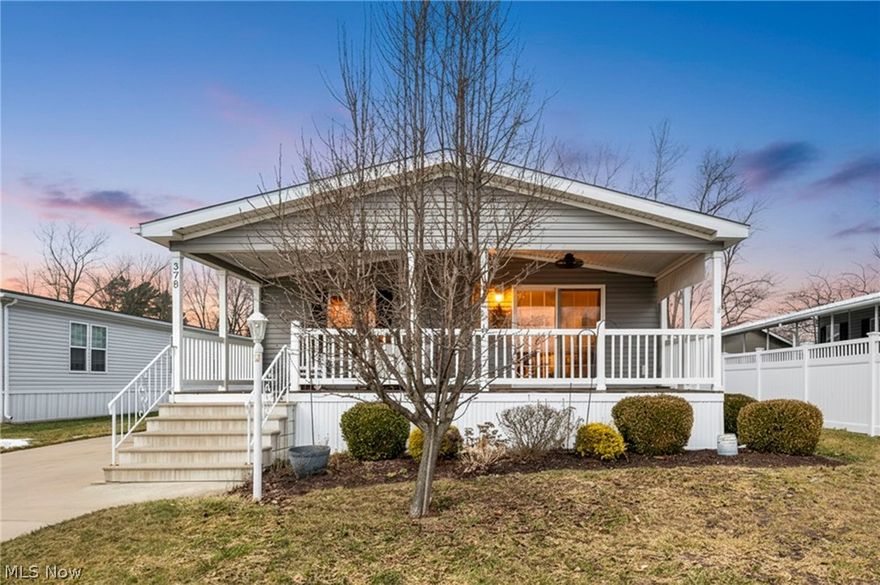 Glamorous, move-in-ready home w/rare oversized covered front porch in the highly sought-after Twin Lakes 55+ Gated Community.  Nestled in a private country setting, Twin Lakes offers peace, privacy, and a vibrant lifestyle w/wide paved streets, curbside mailboxes, well-manicured lots, on-site management. Beautifully maintained double-wide ranch features 3 bedrooms & 2 full baths w/volume ceilings & abundant natural light. Situated on a desirable street w/large cement driveway accommodating two or more vehicles, storage shed for added convenience. Step inside to an open, light-filled floor plan w/multiple living &  relaxing spaces. Spacious living room showcases attractive trim, elegant crown molding throughout, & sliding doors leading to the magnificent covered porch. Fantastic kitchen is designed for both everyday living and entertaining, complete w/beautiful cabinetry, large chef’s island w/breakfast bar, Included appliances. Adjoining dining area creates the perfect gathering space. Owner’s suite offers a glamorous private bath featuring a massive vanity, oversized soaking tub, generously sized walk-in closet. Comfortable one-floor living includes central air for year-round comfort and a convenient laundry area w/washer & dryer included. Twin Lakes amenities include scenic ponds, pickleball courts, fitness center, clubhouse, and a dedicated dog park. Enjoy an active social calendar with bingo nights, fishing, book club, potlucks, and holiday celebrations. Whether year-round or seasonal living, this home offers comfort, community, and lifestyle at its finest.