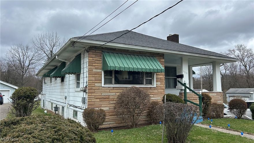 Fantastic New Price! A must See! Lovely 3 bedroom, 1.5 bath- Ranch Home with so much potential for a New Buyer or Investor! One owner for the past 70+years! ~2318 McGuffey Road~  Large covered Patio leads you into the Front Sitting Room. Original French doors open to a cozy room with a Large Picture window, it brings in Fantastic Light it could also be used as the Breakfast or Dining Area.  Solid home with Plaster walls, Wood floors beneath carpeting, decorative cornices atop most of the windows and ceiling fans throughout!  The Kitchen is open with Dark Cabinets complimented by the light Tiled Back Splash & Counter Tops.  The Living room features a Decorative Fireplace with large mantle and Mirror - French door access to the porch as well...Master bedroom is very spacious and has a dual entry... access from the hall or living room. Convenient  L shaped walk-in-Hall closet for extra items and storage. Bright Full Bath w/Tub Shower and Vanity. Second bedroom with hall closet and and also a side entrance to bedroom number 3! That finishes off the first floor.  The Full and Finished Walk-out Lower level makes this home Twice as Nice- Full bar, lounge area, dining area; once there was a kitchen...also a separate flex- room could be another bedroom if needed- Nice half bath down there is a plus, Laundry Room with washer and dryer, Newer furnace and HWT. Need a fruit Cellar? 2 extra storage rooms are available.  1.5 car garage allows you the extra space needed for yard items and room for your ladder and it's nice that it is attached! Call today to schedule an appointment.