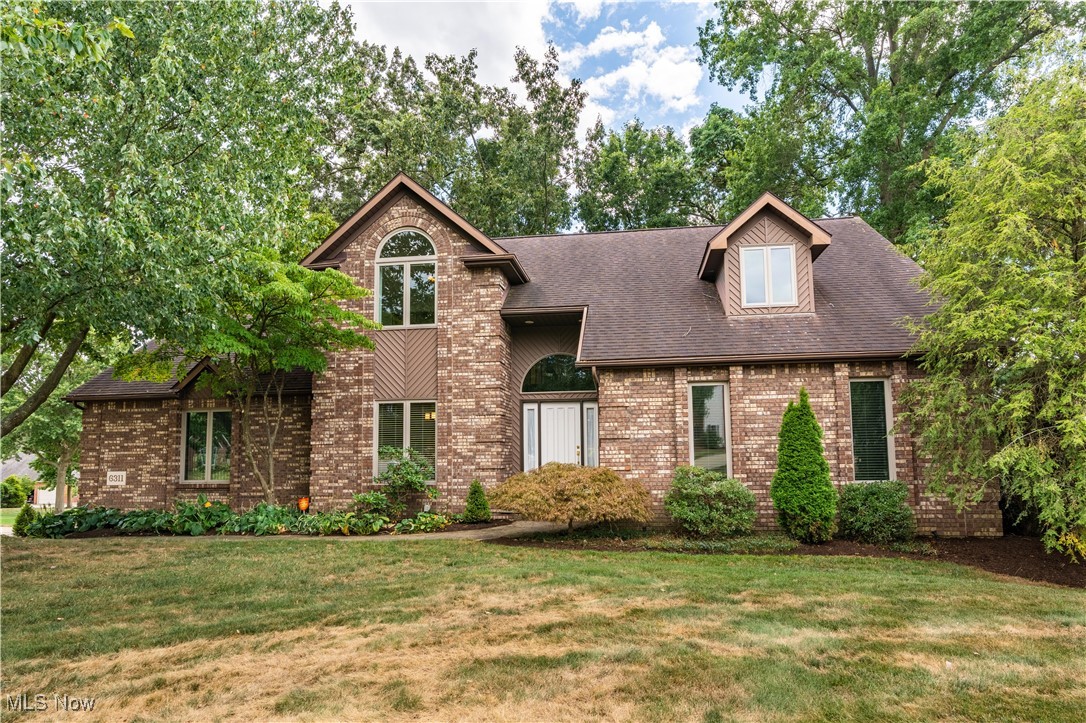 A must-see brick home in Jackson LSD! This beautifully maintained property offers 2,937 sq ft of quality living space filled with natural light and stunning wood floors. Step into the grand two-story foyer, where you’ll find a convenient coat closet and a bright formal dining room on the left. The spacious eat-in kitchen is a delight with abundant cabinetry, an island with storage, display glass cabinets, a breakfast bar, and a dining area with sliding doors leading to a private patio perfect for entertaining. The adjacent great room boasts vaulted ceilings, a dramatic staircase, and a stunning fireplace with a brick hearth and floor-to-ceiling wood-plank surround. The first-floor master suite features vaulted ceilings with a skylight, a large walk-in closet, and a spa-like ensuite with dual sinks (including a vanity), a jetted tub, a walk-in shower with a bench, and a private water closet. Also on the main level is a laundry room with a utility sink and storage, plus a convenient half bath. Upstairs, you’ll find three spacious bedrooms with generous closets and a full bath, including a loft area that overlooks the great room and grand foyer. Additional highlights include an attached three-car garage and an unfinished basement offering endless storage or future living space. All this, just minutes from schools and shopping! Book your private showing today!