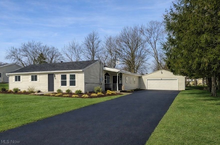 Welcome to this stunning, completely renovated home where modern farmhouse charm meets high-end upgrades. This spacious 3-bedroom, 1-bath beauty offers over 1,800 square feet of beautifully updated living space and sits on a large, fully fenced lot with a deck, truly move-in ready inside and out. The expansive family room addition has been completely rebuilt with brand-new floor joists and subflooring and is highlighted by soaring cathedral ceilings that create a bright, open, and inviting main living space. New luxury vinyl plank flooring, plush carpet, fresh paint, modern lighting, and elegant shiplap accents flow seamlessly throughout. The fully updated kitchen features granite countertops, brand-new appliances, and stylish modern finishes, opening effortlessly into the main living areas—perfect for everyday living and entertaining. The bathroom has been completely gutted and remodeled with contemporary design and quality craftsmanship. Additional updates include all new appliances, a new hot water heater, an oversized attached garage with a brand-new garage door, large closets, and abundant storage. The spacious fenced backyard with deck provides the perfect setting for outdoor living and entertaining. One of the largest homes on the street in recent sales, this property offers a rare combination of space, style, and extensive renovations—a true turnkey opportunity. Schedule your private showing today. Some photos have been virtually staged for illustrative purposes.