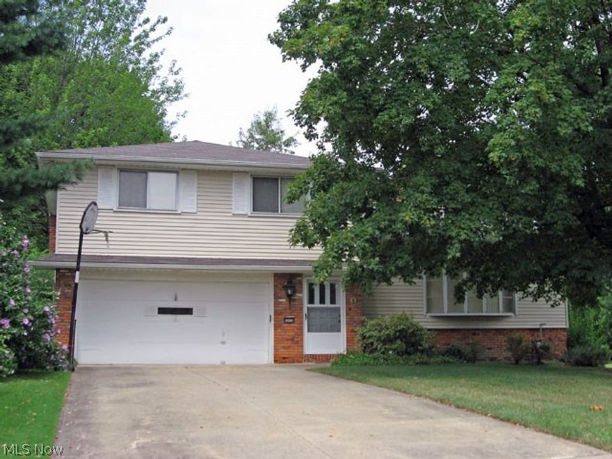 Available immediately.  Split level home, hardwood floors throughout.  Newer windows. Large, wooded pie-shaped lot on quiet street. New furnace and patio, many updates.