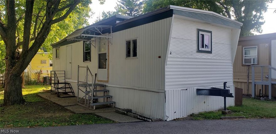 This mobile has some nice updates and it is ready to move in!  Nice & open living room and kitchen area, full bath with laundry hook up for stackable units, 1 bedroom with large closet space.  Located across from Springfield Lake, close to shopping, expressway and more.  Priced to sell!  Lot rent 360/mo tenant is billed for: gas, electric, water, sewer. Household trash paid by park.