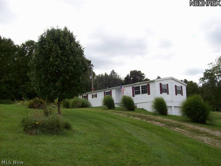 Nice 3 bedroom home with 2 Full Baths, New Carpet,New Kitchen Cabinets, Two Car Garage   Sun Room, Full Basement, Sets on over 3 Acres.Owner looking for offer