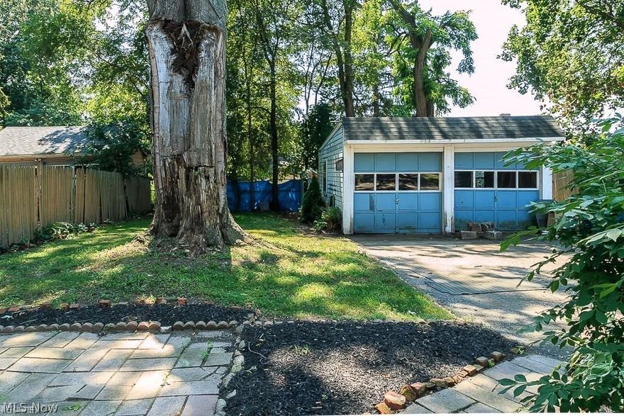 Charming Colonial with inviting curb appeal!  Impressive cherry cabinets in kitchen! Freshly painted throughout!  Formal dining room with hardwood floor.  Warm up by the wood burning brick fireplace in the large living room which opens to the heated sun-room!