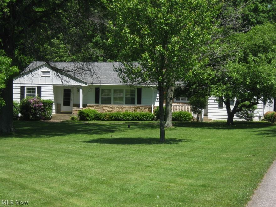 PRICE REDUCED !! Pride of ownership evident inside & outside of this one owner custom built ranch style home located on a beautiful 2+ acre lot.  4B/R! Enter the large foyer with wood floor, your eyes immediately focus on the spacious living room open to dining room & kitchen. Living room features wood burning stone fireplace. The large windows bring daylight galore and a view of the beautiful back yard. Eat-in kitchen with plenty of cupboards and counter space! Laundry room with many built-in cupboards & access to 13x8 mud-room that is steps away from the garage. 4th bedroom on that side of the home can be used for office, den, playroom, etc. Opposite side of the home has 3 add’l. bedrooms with gleaming wood floors and spacious closets. All bedrooms have ceiling fans. Every room features separate thermostats.The oversized 2 car garage with tandem 26x16 work area is a true bonus! Rear double doors to move machinery through, abundant electric outlets, heater. Full attic above entire gar