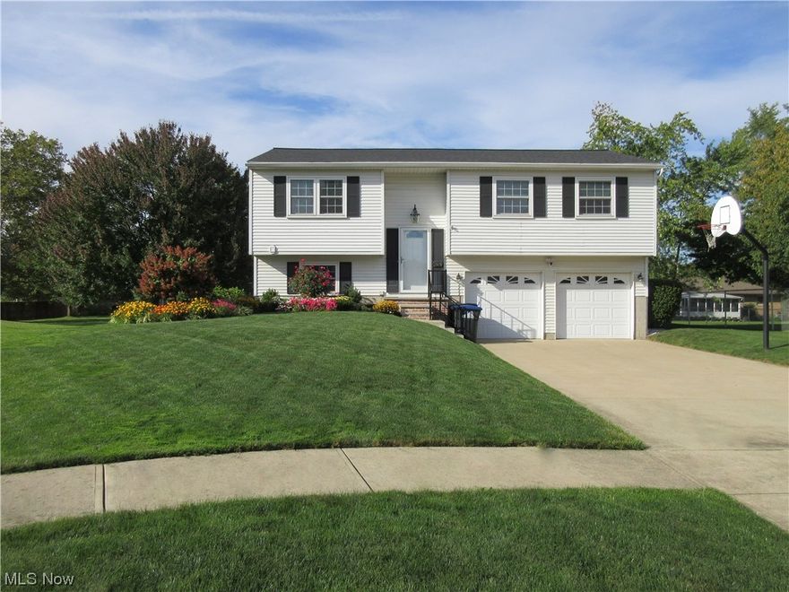 Immaculate 1503 SF Bi-Level on Cul-de-Sac. Spotless & Ready to Move Right In! Two Story Foyer, Open Modern Neutral Living Room to Spacious Eat in Kitchen. Granite Countertops, Vast Amount of Cabinet Space. Range, Fridge, Dishwasher, Microwave, Disposal All Stay. Nice Size Master Bdrm w/Double Wide Closet, Modern Paint & Neutral Carpet. 2nd & 3rd Bdrms w/Modern Paint & Neutral Carpet. Updated Full Bath w/Granite, Soft Close Vanity & Remodeled Shower/Tub. Walk Out Finished Rec Rm w/ Modern Paint, Newer Carpet, 2021 Sliders lead to Concrete Patio & Spacious Backyard. 2nd Full Bath Completely Remodeled w/Striking Walk In Seated Shower. Spotless Attached Two Car Garage w/2020 Epoxy Floor, 2022 Garage Door Openers, Cabinets, Water, Drain, Electric. Beautifully Large Landscaped Yard w/Shed to keep Garage Nice & Clean. Laundry Rm Includes Washer & Dryer. Carrier Furnace & C/A 2016, Roof 2019 (1 layer) So many Updates! Ask your Agent for Home Info Sheet. No Worries – Home Warranty Included!