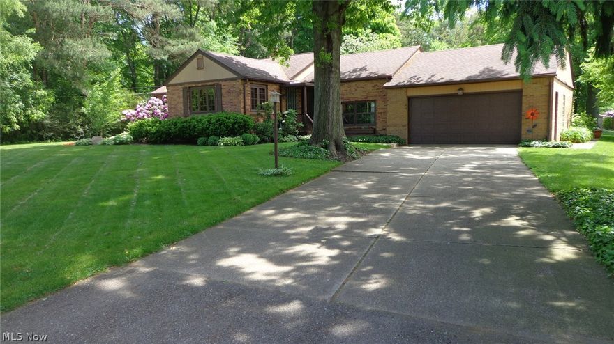 This well kept Brick ranch boasts over a half acre lot with plenty of room for entertaining by the fire and kids to play. Plenty of light shines through on the Pella windows for viewing the nicely landscaped beds and yard. Fantastic new updates in the kitchen can be found including a more open view of the living room, corian counter tops, flooring, lighting, fixtures, backsplash, and all appliances included. Leading from the kitchen access can be gained to the outdoor sun room with dual fans, carpet, and makes for a great escape during intermittent weather. The concrete patio has ample room to entertain and grill out in those summer months. A side family room allows for nice separation between the main part of the house with refinished wood steps leading from the kitchen. The main bathroom has been uniquely updated with Bamboo cabinets and built in's and the tub surround design in tile. Rooms are moderate in size but ample enough for a small family or someone looking to down size. The
