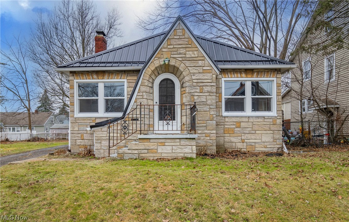 Welcome to 2020 13th Street! Don't miss this charming stone front ranch sitting on a double parcel lot. Enjoy first floor living with character at every turn, including original arched doors and doorways. A living room with a fireplace and a formal dining room flow nicely into the fully applianced kitchen. Three great sized bedrooms and a full bath complete the main level. You will find the laundry area and extra storage space on the lower level. The exterior features a large second lot, back patio, and two car detached garage. Notable updates include: New roof 2021. Water service from the street 2023. Basement water proofing 2019. Electric service from the street and updated in home 2018. Washer/dryer included. Schedule your private viewing today!