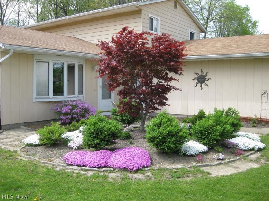 A great home for the price.  Within walking distance of Lake Erie!  This large 4 bedroom, 1 and 1/2 bath home is move in ready with new carpet throughout and a fresh coat of neutral paint on the walls.  Home has an open concept and features a large family room with fireplace and patio doors that lead out to the fenced-in backyard.  Also, features bedroom on the main floor, other 3 bedrooms are located on the second level.  Nice location in Sheffield Lake.  Please call for a private showing today!