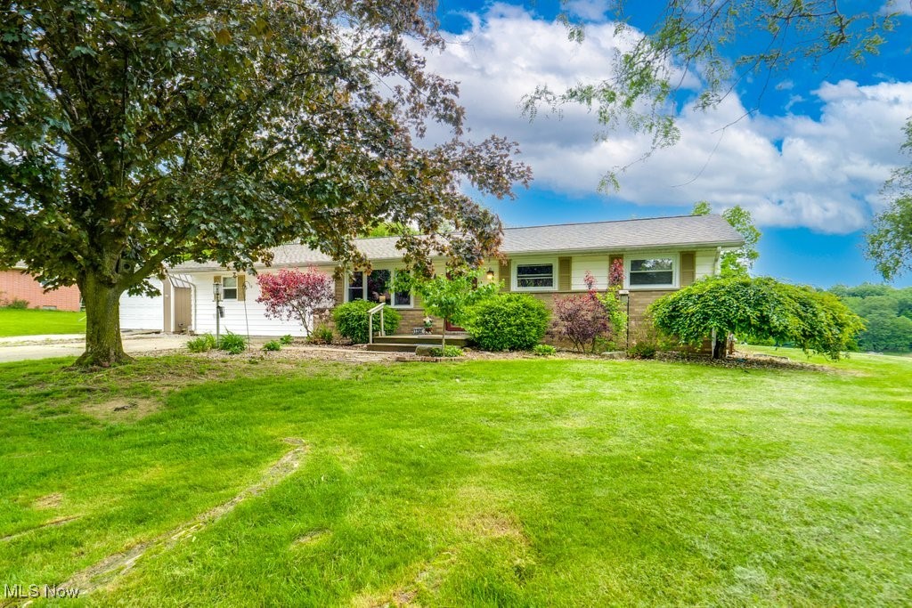 Welcome to 1260 Pleasant Ridge St SE, Minerva! This updated, extended ranch has so much to offer! 4 bedrooms on the main level are a great beginning! The largest bedroom has a full walk in closet and has sliding doors that lead out into the back yard oasis with a view that is hard to beat! Still on the main level, you have a fully updated kitchen with ample cupboard space. A large dining room right off of the kitchen connects to the living room making it a cozy and open space for everyone. A full bathroom as well on the main level. The basement is partially finished with 2 rooms, laundry, another full bath and still room left for storage! Outside you have enough yard to relax and enjoy without too much maintenance. A nice, quiet area for walks and bike rides. Very central location to Alliance, Canton, Minerva, Carrollton, and Malvern. Not too far from much but you get out of town! Call today to see this one!