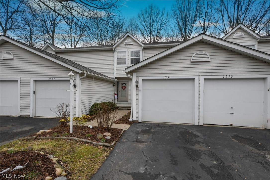 Beautiful two bedroom condo is Stow. Most rooms freshly painted. Privacy fence around deck/patio looking out at the wooded lot. Ready to move into. Would be great for a smaller household, such as someone just starting out or downsizing for retirement.