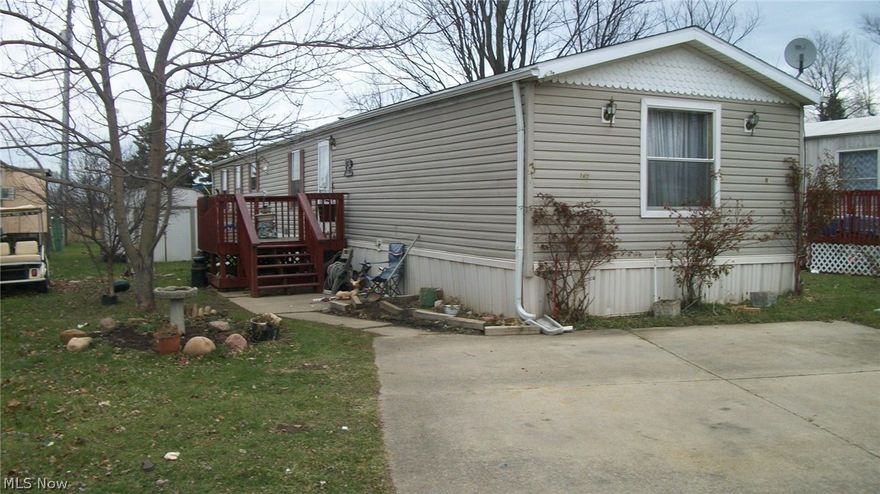 Single wide manufactured home on a rented lot in New London.  2001 Redman trailer w/3 bedrooms & 2 varhs.  Well maintained, includes range, refrigerator, micorwave & washer.  Montly lot rent paid to mobile home park.