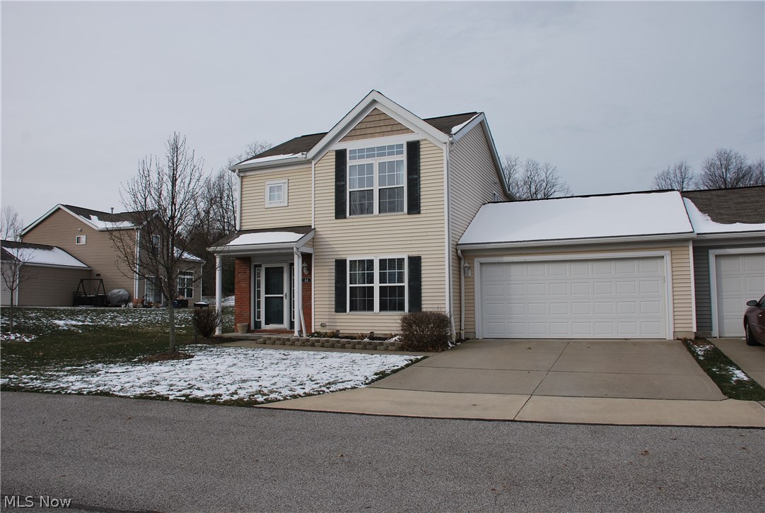 Welcome to this awesome 3 bedroom & 3 bathroom home that was the former model home of the development so it has all the bells & whistles of a model home! Some of these upgrades include accent designer paint colors throughout, Transom Windows in the Vaulted Great Room & Master Bedroom, Corian Countertops with raised breakfast bar, Brushed Nickel finishes throughout including the kitchen & bath faucets, lighting, all of the door handles, the cabinetry knobs & all the accessories! Also the flooring has no vinyl flooring, it is all the wood look laminate flooring throughout the first floor including the 1st floor bedroom/office, ceramic tile in the kitchen, laundry & all 3 bathrooms & model grade carpet in the upstairs hall & bedrooms! This former model home features a 1st floor bedroom or office which is currently being used as a music room; vaulted 2-story Great Room with awesome transom accent windows, breakfast bar & open concept to the Kitchen & Dining Room; 1st Floor Laundry & 2 car