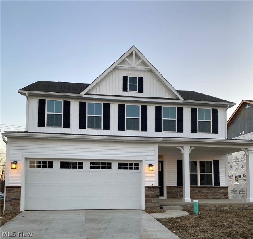 Here is a rare opportunity to own a Brand-new, MOVE-IN READY home in the coveted Twinsburg SCHOOL DISTRICT! This beautiful home boasts a partial stone exterior with a full front porch. The first floor features a private, enclosed study with large windows and French doors. Past the staircase, this home opens up into a large space featuring a bright great room with a striking stone fireplace. The great room opens to the spacious white kitchen & convenient dinette space-perfect for entertaining! The kitchen features an oversized island with exceptional counter space, upgraded white cabinetry, modern granite countertops, built-in wall oven, & Stainless Steel Appliances. The family entrance from your garage is a perfect mudroom and transition to the kitchen space. Upstairs, you will find three spacious bedrooms, a shared hall bath, and a convenient center laundry room!  Everything is big in the master- the bathroom, the living area, and the giant closet with a full sized window for natural