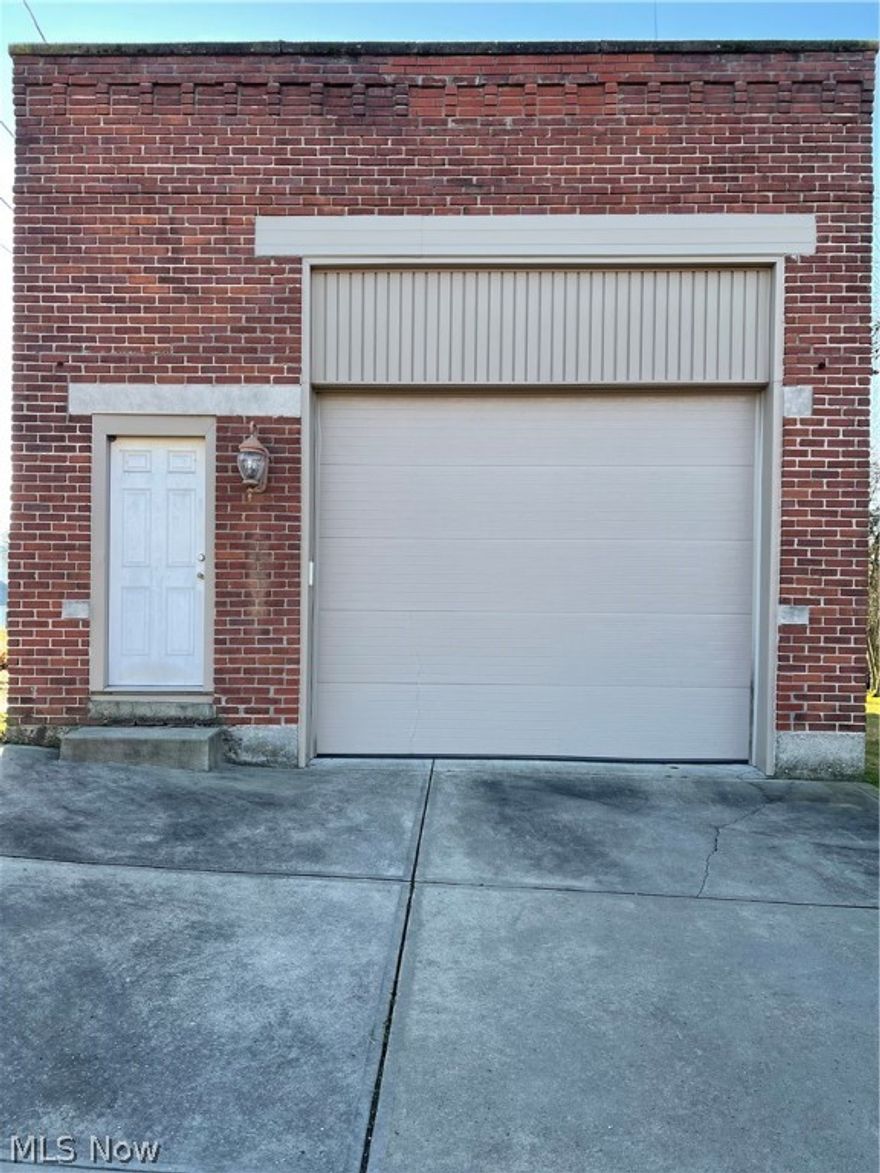 Beautiful Brick Building,  Currently used as garage /storage.  Per owner will hold 6 cars.  Full Bath and office area in a great location just behind the post office on a dead end street.  There is an additional Acre of ground listed for sale separately across the street.Turn At the post office