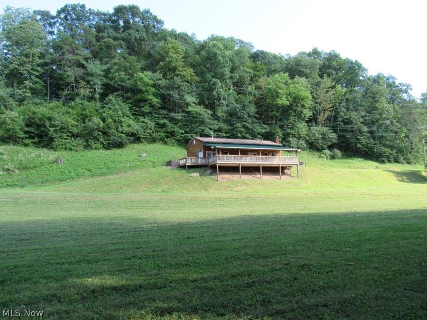 Beautiful, quiet, perfect country location. 3 bedroom, spacious country kitchen, dining room, bath/laundry room. home offers high ceilings. Reduced gas rate (per owner), electric, well, septic. Whole house generator. Central heat, wood stove. Security camera. Large 16x48 front porch. Views of large level lawn and Annamoriah Run side deck, carport. East side of property boarders approx 2,000 feet of river frontage. Older 2 story barn, pasture, meadows. 2 private campsites near completion,electric, septic, water, possible more campsites, river lots. Chestnut, pear trees. Excellent fun place to live/camp/retreat. Exceptional hunting, fishing, wildlife. Easy level entrance. Must see to enjoy!