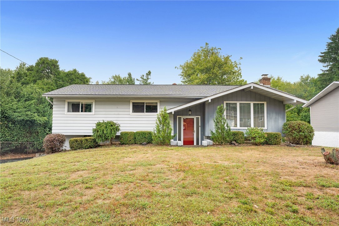 Come see this move-in-ready home featuring 3 bedrooms and 2.5 bathrooms on a quiet residential street in Coventry LSD. Offering approximately 1,862 finished square feet, you are welcomed up into the living room, kitchen, and dining area. Down the hall, you’ll find 3 bedrooms with 2 full bathrooms — including an en suite with shower and a guest bath with tub. All bedrooms showcase beautiful hardwood flooring. A large deck off the kitchen overlooks a spacious backyard. The finished lower level provides additional living space with a cozy fireplace, bar seating area, guest half bath, laundry, and a sliding door for direct backyard access. A two-car attached garage and extra parking out back add to the convenience. The home is ready for your cosmetic touches, but major updates are already done: new furnace (2024), new AC unit (2024), new deck railing (2025), and new hot water tank (2022). Finding a quarter-acre lot with nearly 1,900 finished square feet, 2.5 baths, finished lower level, and an attached 2-car garage in Coventry for under $200K is a rare opportunity. Centrally located with easy highway access — this home is ready for immediate occupancy and won’t last long! Check out 3D Tour to walk through home virtually today.