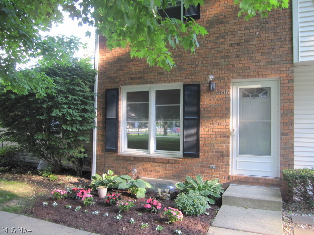 This is truly a one of a kind unit with cutting edge updates that include, Scandinavian Design Kitchen in natural cherry. Custom laminate counters and hardware. Stainless steel sink and all newer appliances in kitchen included, including microwave. This unit has a 1/2 bath, gorgeous finished basement. Newer carpeting. All newer interior colors many rooms just painted. All new vinyl replacement windows and doors. Corner counter in main bath with maple vanity. Sliders to private patio. Ceilings fans in kitchen and bedrooms - interior doors and trim all newer. Development has pool and clubhouse w/game room. Walking distance to 3 golf courses.