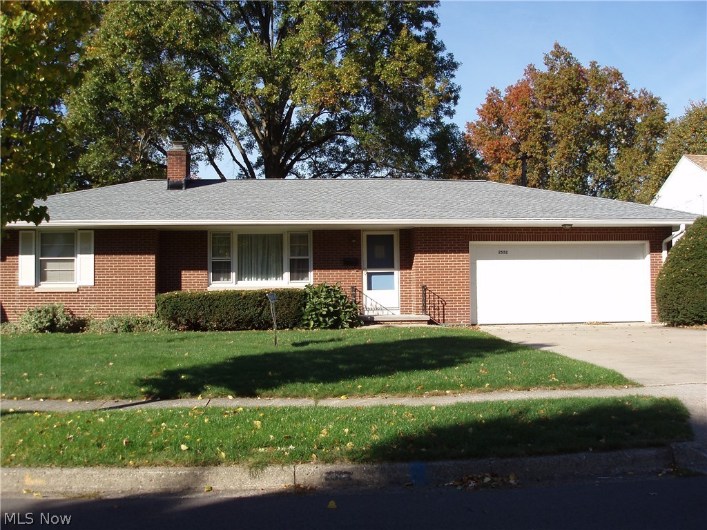 Nice 2 Bedroom Brick Ranch with formal dining room, and 2 car attached garage.Enclosed Back Porch. Extra bathroom in basement.