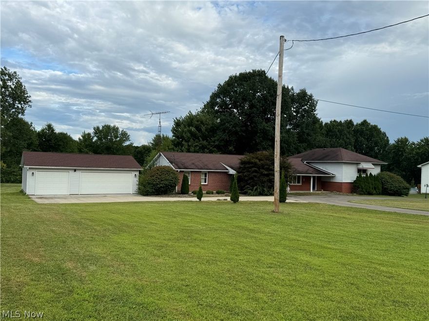A large family will have plenty of private space with the benefit of separate and complete living quarters with their own entrance. Sunroom, plenty of garage space and parking.  Generator, some appliances have been removed.