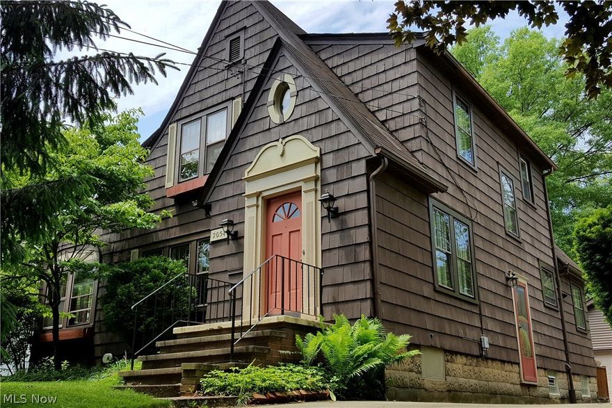Gleaming hardwood floors, a traditionally-styled white kitchen with tall cabinets and ceramic floor, a family room with vaulted ceiling and airy skylight, arched doorways - this home is a gem in a super location.  Through the front door you find a sizable living room with fireplace and built-in shelving.  Tucked behind the fireplace is a sunny first-floor office/library which could also be a great playroom.  The formal dining room features a recessed niche, built-in corner cabinets and room enough to host many dinner guests.  The kitchen opens to the family room addition - a great layout for entertaining!   On the second floor you will find three bedrooms and a full bathroom, while the lower level has a rec room and clean, open basement with built-in storage.  This home has so much to offer the discerning buyer!  Enjoy your summer on the large deck overlooking the landscaped yard.  Plus, the two-and-a-half car garage offers ample storage for your vehicles and all of your outdoor toys a