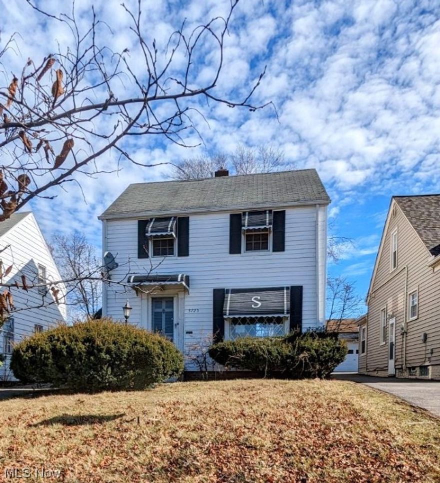 Opportunity knocks!!  Investors welcome! This two bedroom Colonial offers hardwood floors throughout.  Added charm with curved archways and corner built-ins in the dining room.  Large picture window that allows for a lot of natural light in the living room and dining room.  A partially finished basement and laundry area. A two car detached garage in the private back yard. Bring your ideas!