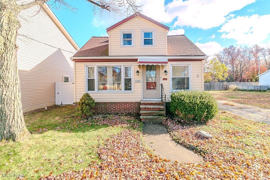 Welcome to 1259 E. 351 — a three-bedroom, two-full-bath master bungalow that blends charm, comfort, and modern convenience. Step inside the inviting enclosed front porch, a bright and versatile space ideal for morning coffee, seasonal décor, or additional lounging. The main level features an open and airy living room enhanced by laminate plank flooring, built-in bookshelves, and a large picture window that fills the home with natural light. Adjacent is the formal dining room, perfect for gatherings and everyday meals, offering seamless flow into the updated kitchen. Here, you’ll find granite countertops, updated cabinetry, and a ceramic tile backsplash that provides a clean, modern finish.
The first-floor master suite is a standout feature, offering true one-floor living. This private retreat includes an updated full bathroom with a granite double vanity, ceramic accents, newer fixtures, and a refreshed shower—designed for both style and comfort. Upstairs, two additional bedrooms and a second full bathroom provide excellent flexibility for family, guests, or a dedicated home office.
Outside, the fully fenced-in backyard delivers a perfect combination of privacy and function, complete with a tall privacy fence and a spacious deck ideal for outdoor dining, entertaining, or relaxing in warmer months. Central air conditioning ensures year-round comfort, and the home’s thoughtful updates make it truly move-in ready.
This home offers exceptional value in a convenient Eastlake location near parks, schools, shopping, and freeway access. A must-see property for buyers seeking space, updates, and comfort at a great price.