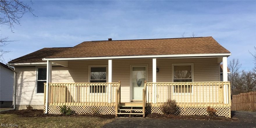 Large redone front porch welcomes you to this adorable and completely renovated ranch. Kitchen has been updated with brand new white shaker cabinets, appliances (installed in 2017) and counter tops.  Dining room has French doors opening to the enclosed sun room which offers an abundance of natural light and extra entertaining space.  Energy efficient heater in sun room for all year use.  Entire main floor has new light fixtures, flooring and fresh paint throughout.  Rounding out the updates a High efficiency furnace and AC were installed in October 2016. 
Large 2 car detached garage offers loads of space.  And with the long paved driveway providing lots of room for guests, invite over your family and friends!
You've got to see this one. Call to schedule your showing today!
