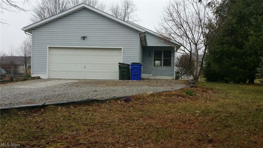WOW! Move right into this darling 3 bedroom 1 1/2 bath ranch home within walking distance to the Main Campus of Kent State. 2 car attached garage. Enjoy this awesome completely fenced in backyard (6' vinyl privacy fence) from your deck or new 500sf paver patio! New Roof (2017).  Newer HVAC. Newer flooring. Upgraded insulation. Newer 10x10 shed. Basement is partially finished with 1/2 bathroom!