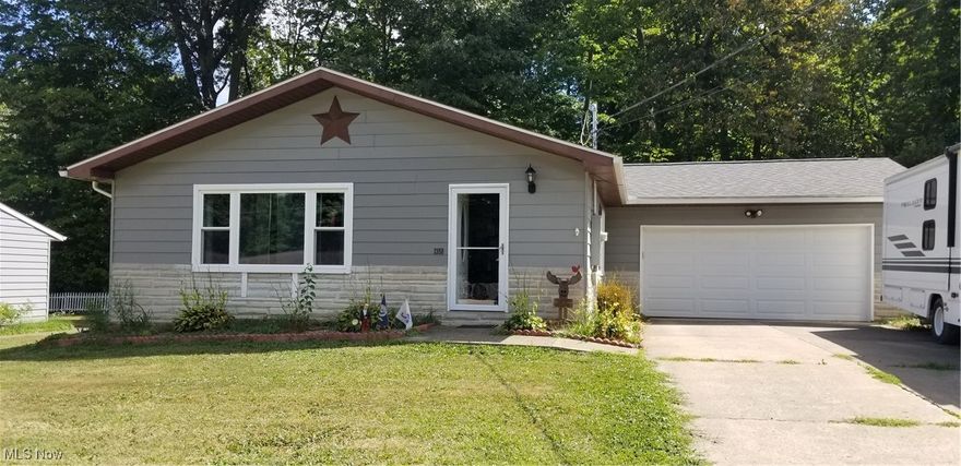 Tucked away on a quiet dead-end street, this delightful 3-bedroom, 2-bath ranch home offers comfort, convenience, and plenty of charm. With cute curb appeal and a wooded backdrop, it’s the perfect blend of cozy living and peaceful surroundings.  Inside, you’ll find a nice-sized living room and a welcoming eat-in kitchen — great for everyday meals and gatherings. Step out back to enjoy the scenery and fresh air from the back porch.  Recent updates include newer windows (approx. 2 years old) and an upgraded 200-amp electric service, giving you modern efficiency and peace of mind. The 2-car garage adds extra convenience with parking and storage space.  Whether you’re just starting out, downsizing, or looking for single-floor living in a quiet setting, this home has so much to offer.  Schedule your private tour today and see the charm for yourself!