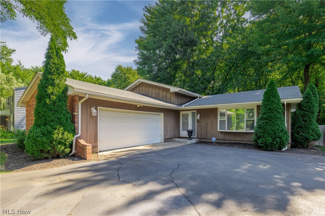 Move right in to this beautifully updated split level located on King Memorial in south Mentor! Wide open first floor plan that features a brand new eat in kitchen with solid wood, white shaker cabinets and granite counters. Opening up to the family and dining room, the first floor is an excellent area to gather and entertain. Upstairs features 3 bedrooms and 2 full bathrooms including an ensuite in the master. On the lower level you will find the laundry room, 1/2 bathroom, bar area that leads to the 2 car attached garage and recreation room with a brick fireplace. The backyard is a dream. Very large and fully fenced in with a deck off the dining room, fire pit and storage shed for lawn equipment. Updates include: Kitchen (2022) Carpet and flooring (2022) Bar area on lower level (2022) Down stairs floor (2020). This one checks all the boxes! Make your appointment today before its gone!