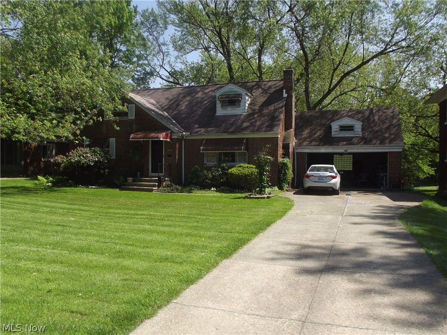 In this Brick income bungalow, it offers a separate in-law suite with two bedrooms, full bath and eat in kitchen. Two spacious bedrooms on the first floor, formal dining with built-in china cabinets, large living room with wood burning fireplace, eat in kitchen. The lower level features a private office area, recreational area, utility room, multi purpose room with a walkout to the 2 car attached garage, leading out to your approximate one acre of land. Its like owning your own private golf course or private metropolitan park. This property was built in 1952; the owners have lived there since 1961, that's right only two owners have lived here, you can be the third owner to enjoy several years of pride in ownership also. Perfect for family functions such as reunion, marriages barbeques, you name it. Please note we need two hour notice for all showings.