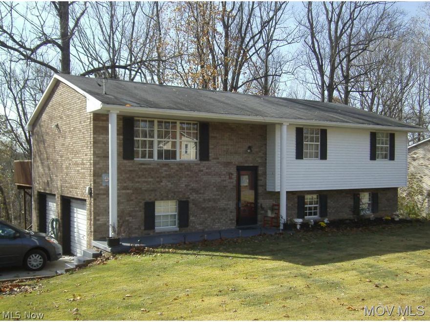 Split entry home located on a 1 acre lot, with Little Hocking River frontage. Newer furnace/AC & hot water tank, roof was replaced in 2004, lower level walks out onto a small patio, offers great storage or finishable space & an 8x10 workshop. 12x24 back deck with retractable awning to enjoy the beautiful wooded back yard & trail to the river.  Elem: Little Hocking Elementary Scho  Elem/Bus: Y  JrHigh: Little Hocking  JrHigh/Bus: Y  High: Warren High School  High/Bus: Y  Fire: VOL  Police: SHF  PossFreeGas: N  ;SQFT=Fin L1:1104, Fin Above:1104, Fin Total:1104, Unfin Bsmt:620, Unfin Above:620;GAR= 2 Car Built In