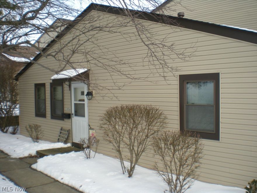 Cozy 2 bedroom 1 bath condo with garage.  Desirable ground level ranch style end unit.  New furnace and newer windows.  Spacious living room with custom blinds and a breakfast bar.  Dining room has a sliding glass door to the deck.  GREAT for entertaining.  Off kitchen is your own in suite washer and dryer.  Both bedrooms are a good size and offer nice size closet space.  ALL appliances stay.