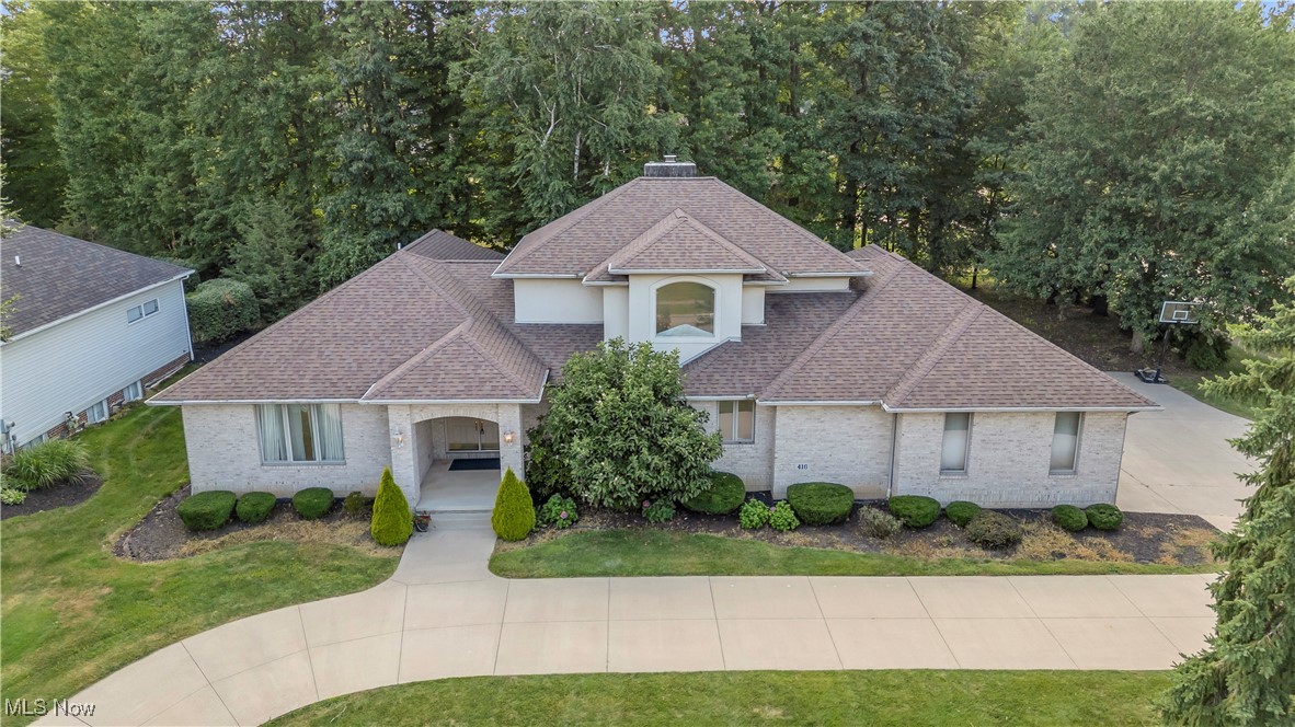 Executive all-brick Colonial in the prestigious Rosefarm community offering over 5644 sq. ft. of total square footage on a beautifully landscaped half-acre lot with a horseshoe driveway . Designed for both elegance and everyday comfort, this home features two first-floor primary suites—ideal for multi-generational living or private guest quarters—and a dedicated first-floor office perfect for working from home.
The heart of the home is the updated chef’s kitchen, complete with premium cabinetry, quartz countertops, stainless steel appliances, and an oversized island that anchors the open-concept layout. The kitchen flows seamlessly into the formal dining room and expansive great room, highlighted by a gas fireplace and walls of windows that fill the space with natural light.
Upgrades include: whole-house repaint, brand-new carpet, updated master bath, newer roof, new whole-house vacuum system, and newer hot water tanks. The exterior showcases timeless full brick construction for low maintenance and exceptional curb appeal.
The second floor offers additional spacious bedrooms, a full bath, and versatile bonus spaces. A full basement with 1,599 sq. ft. is ready for finishing or provides abundant storage. The 3-car attached garage ensures ample parking and workshop potential.
Situated in Copley-Fairlawn School District and minutes from premier shopping, dining, and I-77 access, this home combines luxury, functionality, and location.