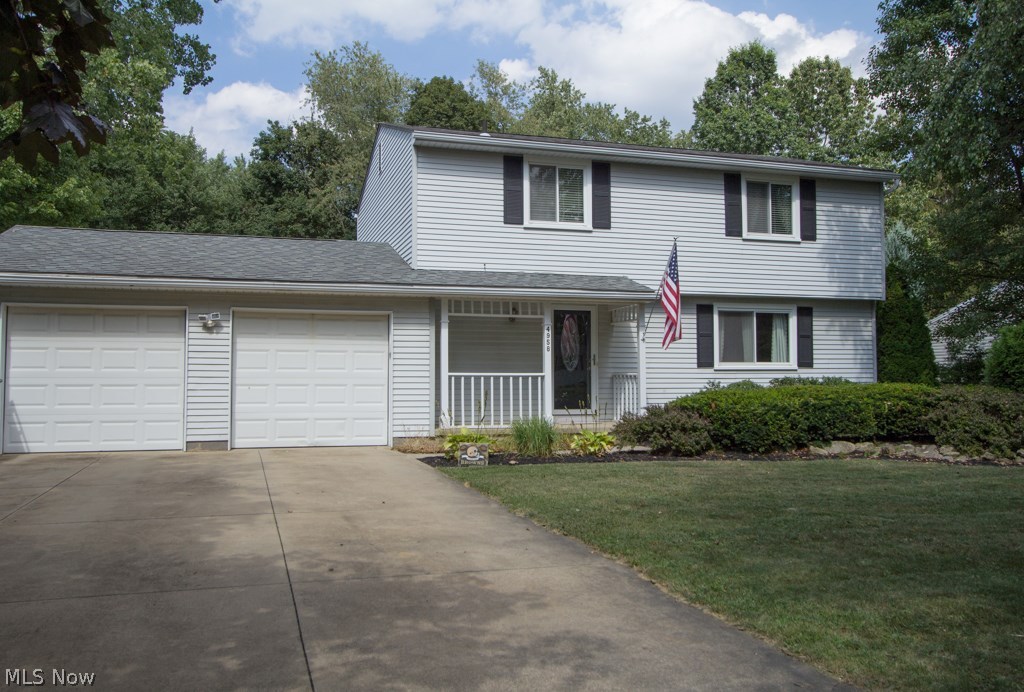 Sparkling clean 3 bedroom, 2.5 bath colonial located in a prime Stow location. This home has so much to offer from the inviting covered front porch to the huge 24 x 20 deck overlooking a spacious fenced yard. The updated kitchen has tons of counter space, newer stainless steel appliances and a ceramic tile floor. All bathrooms are refurbished and feature ceramic tile tub surrounds. The new carpeting, newer laminate flooring and fresh paint are a bonus. All three bedrooms are over-sized for a home in this price range. Other highlights of this home are: updated roof, windows and entry doors, a large formal dining room, separate living and family rooms, and "attention to detail" finished basement and a Spacious Outbuilding. Hurry, this one will not last!!