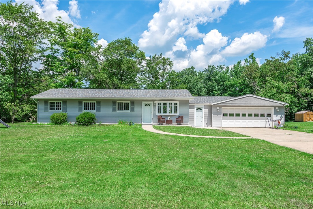 Welcome to this beautifully maintained ranch-style home nestled at the end of a quiet DEAD END STREET in desirable Aurora, Ohio. Situated on a spacious HALF-ACRE LOT, this home offers privacy, comfort, and convenience in a serene neighborhood setting. Step inside to discover a warm and inviting layout featuring three generously sized bedrooms, plus a versatile bonus room that has been thoughtfully converted into a FOURTH BEDROOM—perfect for guests, a home office, or additional living space. With two full bathrooms. Kitchen area has plenty of cabinets; beautiful counter tops with an open floor style including ALL APPLIANCES. The living areas flow seamlessly, offering cozy charm and functional design. The attached garage provides added convenience, and the concrete patio out back is ideal for summer cookouts, relaxing evenings, or entertaining under the stars. Whether you're starting out, downsizing, or looking for one-floor living with room to grow, this property combines comfort and practicality in a location that’s tough to beat. Don't miss your chance to own this hidden gem in Aurora—schedule your private showing today