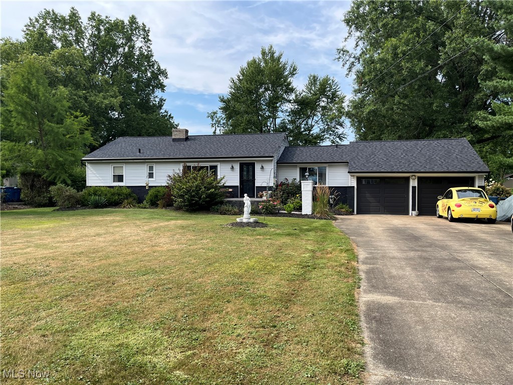 Don't miss this well-maintained ranch home in an inviting neighborhood in Norton! Many seller updates throughout with a large yard over half an acre in town with a vinyl privacy fence all the way around! Two outbuildings/sheds to store your outdoor equipment/furniture, or have your own little shop. Newer roof, sump pump replaced, refinished hardwood floors, a heated garage and sunroom with a hot tub that transfers to the new owners! This home is also getting brand new siding before closing. Full finished basement with bar, and every Cleveland Browns lover's dream painting and decor. Easy access to interstate for travel but without the noise. Close to brand new Norton school campus, and a large concrete driveway. Call for your showing today!