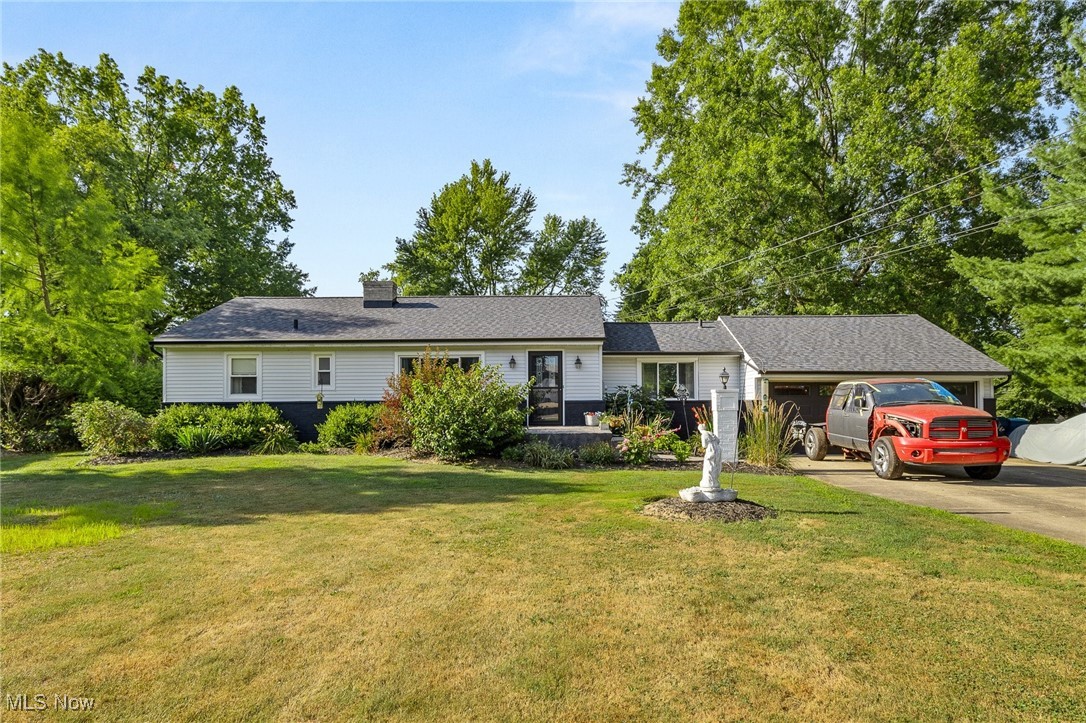 Don't miss this well-maintained ranch home in an inviting neighborhood in Norton! Many seller updates throughout with a large yard over half an acre in town with a vinyl privacy fence all the way around! Two outbuildings/sheds to store your outdoor equipment/furniture, or have your own little shop. Newer roof, sump pump replaced, refinished hardwood floors, a heated garage and sunroom with a hot tub that transfers to the new owners! This home is also getting brand new siding before closing. Full finished basement with bar, and every Cleveland Browns lover's dream painting and decor. Easy access to interstate for travel but without the noise. Close to brand new Norton school campus, and a large concrete driveway. Call for your showing today!