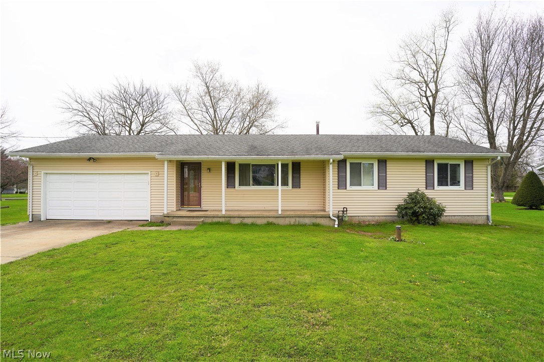 Spacious ranch on over half an acre in Norton CSD! This 3 bedroom, 2 bathroom home has so much to offer! It features an eat-in kitchen overlooking the large backyard, a large family room, a dining room walking right out to the back deck, plus another cozy living space with a woodburning fireplace. The 3 bedrooms have brand new carpet and fresh paint. The large lot includes a storage shed plus the additional outbuilding at the back of the property equipped with electric, gas and water hookups, it could easily be utilized for storage, a work space or as an additional 2 car garage. Newer well pump and electric was updated with a generator. Make this house your own and schedule a showing today!