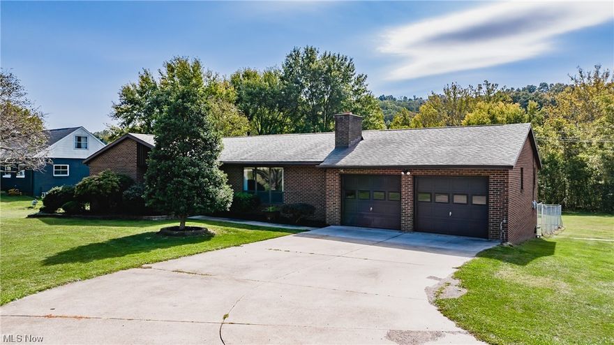 3 bedroom 2 1/2 bath all brick ranch located in a convenient South Parkersburg location.  This home has been freshly painted on the interior, had some new carpeting installed and features stainless steel appliances.  This home features a full unfinished walk-out basement that leads to an extra large lot with 2 buildings that have endless possibilities.  Don't miss your opportunity to view this property today.