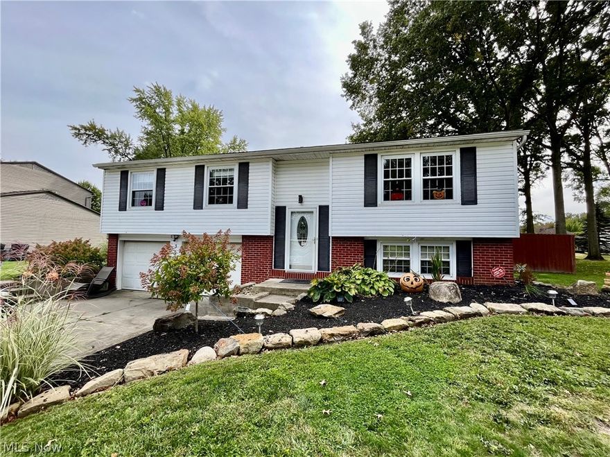 Situated on a quiet dead-end street, this 3 bedroom, 2 bath home has plenty of room to live and grow, both inside and out. The upper level boasts an open floor plan with the living room, dining room and updated kitchen all creating one terrific space. The kitchen offers stainless steel appliances, ample cupboard space and a breakfast bar. You can access the raised deck and beautiful backyard from this level. A nice-sized primary bedroom includes an attached full bath, while the spacious main bath offers a tub/shower combo. The finished lower level provides a large family room, laundry and storage area. The fenced-in backyard is an oasis perfect for playing, relaxing and hosting barbecues. There is a new gazebo for covered seating that overlooks the beautifully-landscaped yard and playset. Updates include: Furnace (2021), A/C (2022), fresh paint, new flooring and new lighting. Schedule a tour today and make this house your next home!