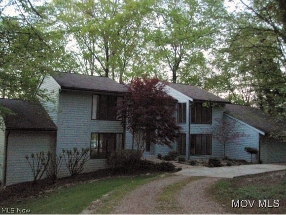 Circular driveway.Custom built & architecturally designed by,Jack Iams.Great floor plan.Complete 1st floor living.Open entry w/ duel coat closets.Formal rooms.Large eat-in kitchen w/abundance cabinetry/counter space,island,skylight,hardwood flooring & breakfast nook w/sliding door to private screened porch.Family room w/cathedral ceiling, large wall unit,skylights, WBFP & complete window wall w/doors to large rear private deck.Master suite w/cathedral ceiling, window wall,walk in closet,corner Jacuzzi tub w/window walls,separate shower,double vanities & sliding door to deck.Rec room w/wet bar Elem: Harmar Elementary School Elem/Bus: Y JrHigh: Marietta Middle School School JrHigh/Bus: Y High: Marietta High School High/Bus: Y Fire: VOL Police: SHF ;SQFT=Fin L1:2317, Fin L2:941, Fin Bsmt:1403, Fin Above:3258, Fin Total:4661, Unfin Bsmt:914, Unfin Above:914;GAR= 2 Car Att, Opener(s);PRKG= Off Street, On Street