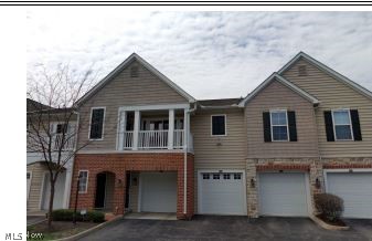 Excellent location in the highly desirable Broadway Condominium Community! Beautifully landscaped area for an easy living lifestyle. Close to highways and shopping, and Columbus Taxes! Downtown Dublin and Hilliard only minutes away. Second floor 2-bedroom, 2-bath condo with attached 1-car garage. The large, vaulted great room has a fireplace to relax, and a popular open kitchen model with eating area and balcony. The kitchen features laminate counter tops, island/breakfast bar and stainless appliances. The master suite has vaulted ceilings with a walk in closet and bath with double sinks. One additional bedroom/home office and another full bath. Easy access to Tuttle Mall and I270.