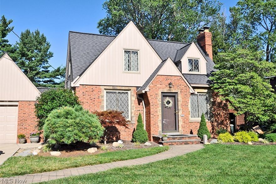 Great Opportunity with this absolutely gorgeous all brick bungalow style home on a desirable residential street!  This is a 2 Bedroom/1.5 bath home but this home is much LARGER than it appears! You have to visit this home and see the huge Family Room addition with a dramatic fireplace and abundant natural lighting with the many windows that view the super cute backyard! Walk in from the front door and enter the Foyer area, See the gorgeous hardwood floors in the large stately Living Room with fireplace and the formal Dining Room with built-in cabinets! Enter the updated Kitchen with eat-in sitting area with sliding doors to access the backyard wooden deck area! This beautiful updated kitchen has granite countertops and loads of cabinet space!  All newer Kitchen appliances stay as well as the washer and dryer! See all your Holiday Gatherings being held in this spacious Family Room! The entire home has an open floor plan! The second floor has two generous size bedrooms and Full Bathroom!