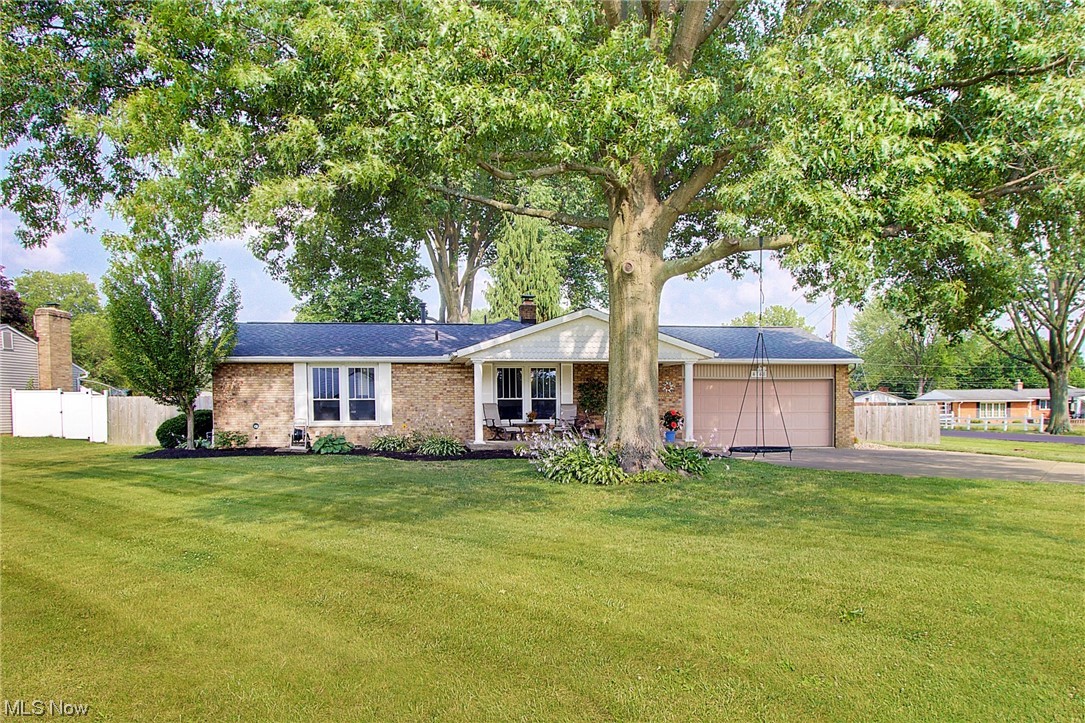 Welcome to your new ranch home in Jackson Township!! This house has been freshly landscaped with a fenced in back yard and plenty of space for your next barbecue while enjoying your beautiful sunroom. The kitchen features a large bar with solid surface counters along with a very generous dinette area. Head downstairs to a large rec room with a wood burning fireplace and half bath along with a shower in the laundry area. Home has been freshly painted and has a brand new roof in 2023!! Garage is oversized and has plenty of storage. Make an appointment today to see this amazing home!
