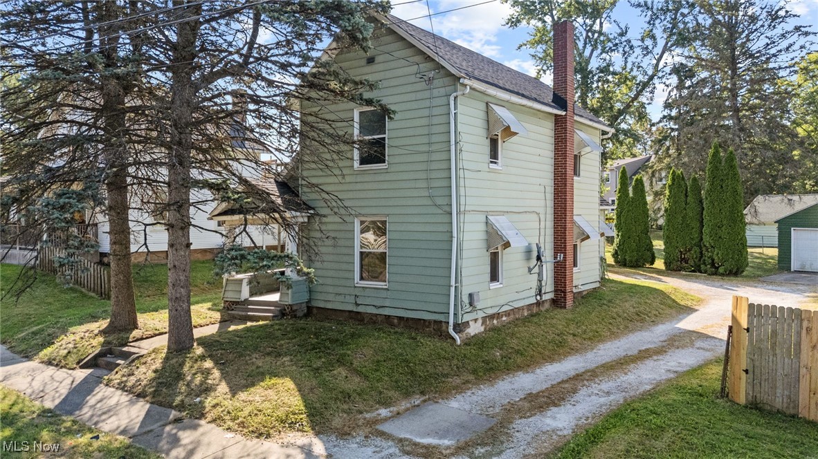 Welcome home to 1450 Wooster Rd in Barberton! This is a 3 bed 1.5 bath two story home ready for your personal touches. Large lot and 2 car garage too! Roof is from 2022. Furnace is from 2022. Bring your decorating ideas and move right in! Call your favorite Realtor today before it's too late!